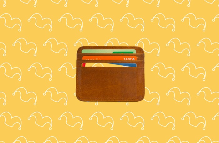 A small wallet showing it holding three credit cards