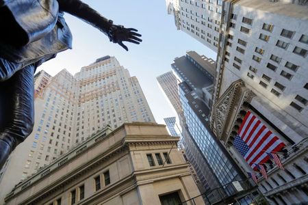 The statue of former U.S. President George Washington is seen across from the New York Stock Exchange (NYSE) following Election Day in Manhattan, New York City, U.S., November 4, 2020. REUTERS/Andrew Kelly