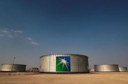FILE PHOTO: A view shows branded oil tanks at Saudi Aramco oil facility in Abqaiq, Saudi Arabia October 12, 2019. REUTERS/Maxim Shemetov/File Photo