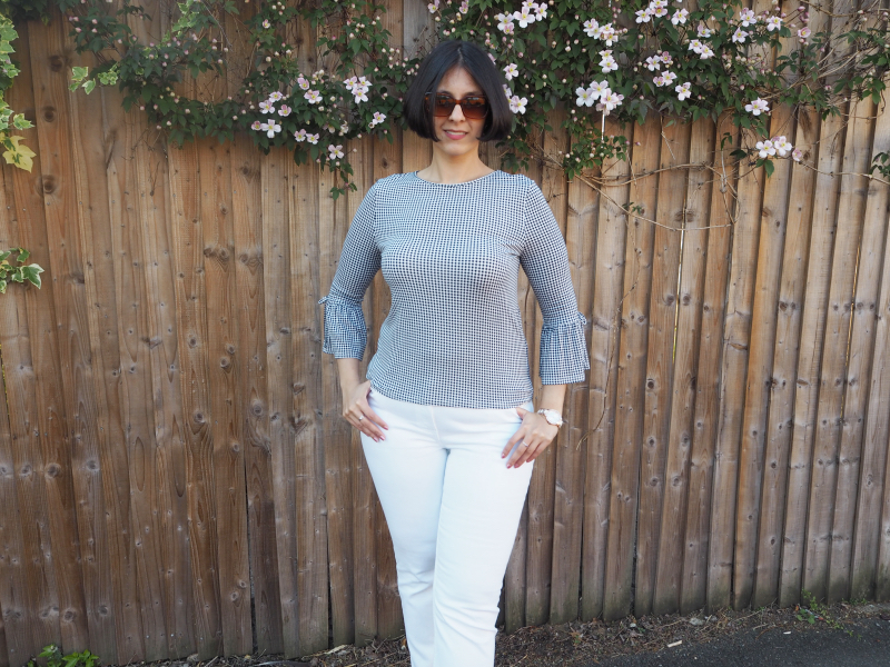  Gingham top with bell sleeves and white jeans 