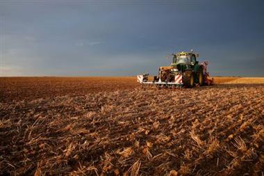 A French farmer sows winter barley during sunset in Tilloy-lez-Cambrai, France, October 3, 2019. REUTERS/Pascal Rossignol
