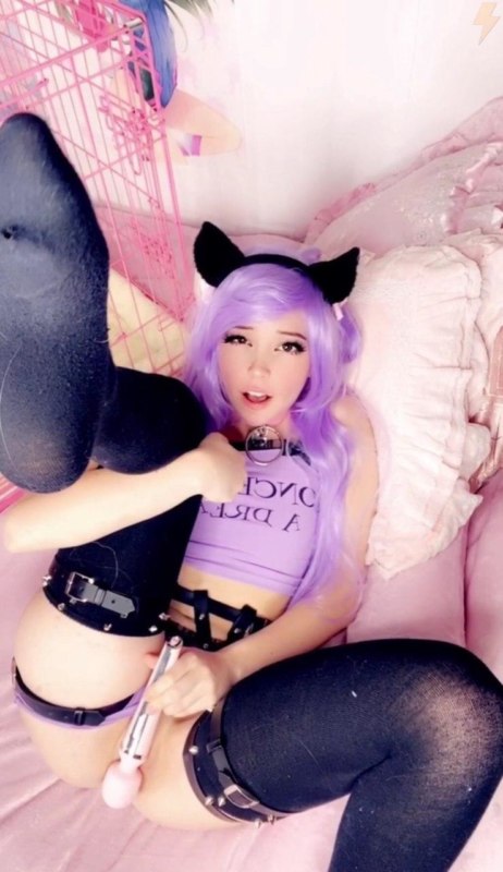 Streamer Belle Delphine in a purple wig plays with adult toys. 