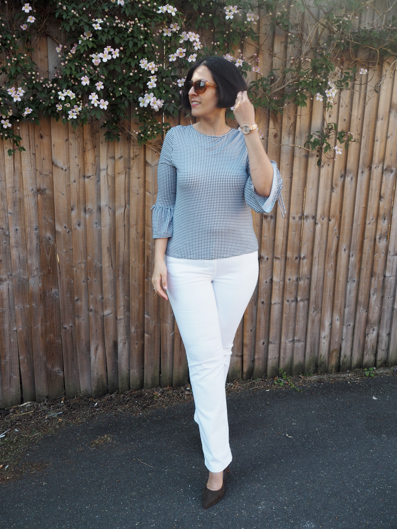  Gingham top with bell sleeves and white jeans 