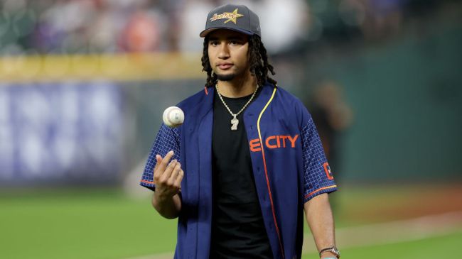 cj stroud toss a baseball