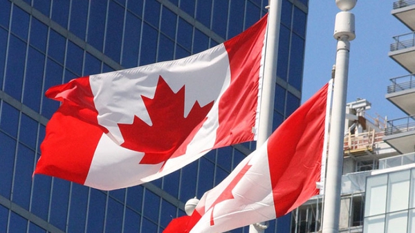 Двух канадцев освободили в Китае после решения вопроса с финдиректором Huawei