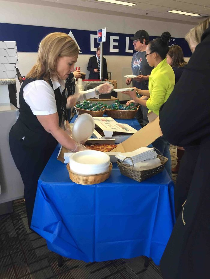 My Flight Is Delayed, So The Delta Staff Brought Us All Hot Pizza And Soda