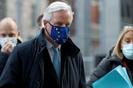 European Union's chief Brexit negotiator Michel Barnier, wearing a face mask, leaves the Brexit trade negotiations in London, Britain, November 12, 2020. REUTERS/Peter Nicholls