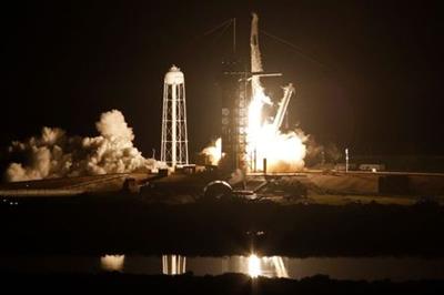 A SpaceX Falcon 9 rocket, with the Crew Dragon capsule, is launched carrying three NASA and one ESA astronauts on a mission to the International Space Station at the Kennedy Space Center in Cape Canaveral, Florida, U.S. November 10, 2021. REUTERS/Thom Baur