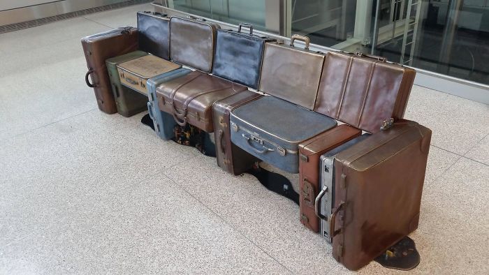 Luggage Turned Into A Place To Sit At The Airport