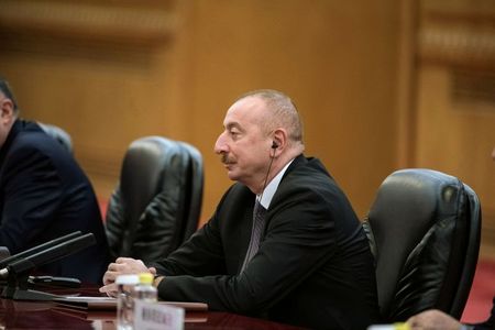 Azerbaijan's President Ilham Aliyev listens to Chinese President Xi Jinping during a meeting at the Great Hall of the People in Beijing, China, April 24, 2019. Fred Dufour/Pool via REUTERS
