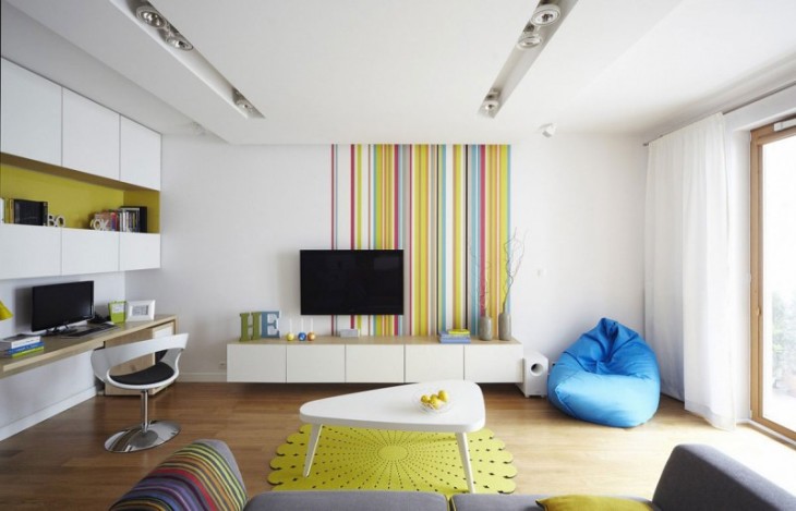 Modern living room with colorful striped wall decor