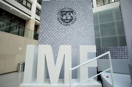 FILE PHOTO: International Monetary Fund logo is seen inside the headquarters at the end of the IMF/World Bank annual meetings in Washington, U.S., October 9, 2016. REUTERS/Yuri Gripas/File Photo