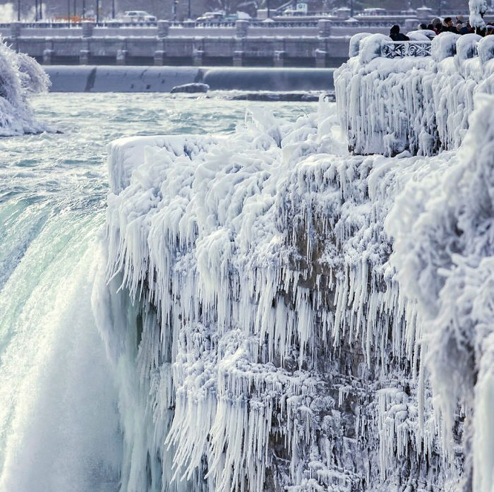 Though Known For Its Hundreds Of Acres Of Lush Terrain And Trails Conducive To Hiking, Niagara Falls State Park Boasts Equally Stunning Views Even As Temperatures Drop And Crowds Thin. Right Now, The Falls Are Completely Coated In Ice — And Absolutely Jaw-Dropping. More Than 3,000 Tons Of Water Flows Over The Falls Every Second. Sometimes The Ice Over The Niagara River At The Base Of The Falls Gets So Thick That People Have Been Known To Build Concession Stands Across It Or Walk Back And Forth Between The U.s. And Canada. Photos By Aaron Lynett/the Canadian Press Via Ap