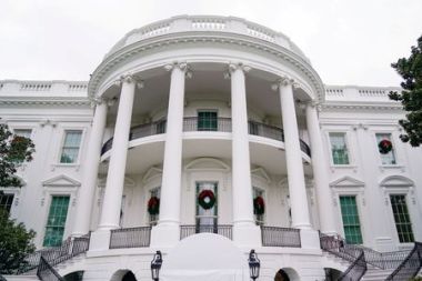 Christmas wreaths decorate the White House in Washington, U.S. November 22, 2020. REUTERS/Erin Scott