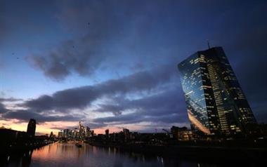 The skyline with its office buildings and the banking district are photographed during sunset as the spread of the coronavirus disease (COVID-19) continues and the German government plans new pandemic control measures in Frankfurt, Germany, November 18, 2021. REUTERS/Kai Pfaffenbach