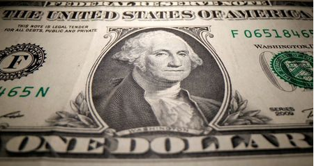 FILE PHOTO: A U.S. Dollar banknote is seen in this illustration taken May 26, 2020. REUTERS/Dado Ruvic/Illustration/File Photo