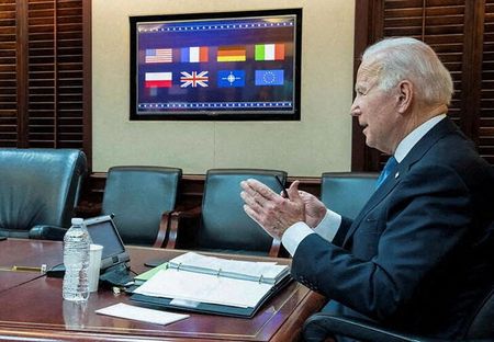 U.S. President Joe Biden is seen in a White House handout photo as he speaks with European leaders about Russia and the situation in Ukraine during a secure video teleconference from the Situation Room of the White House in Washington, U.S., January 24, 2022. The White House/Handout via REUTERS THIS IMAGE HAS BEEN SUPPLIED BY A THIRD PARTY.