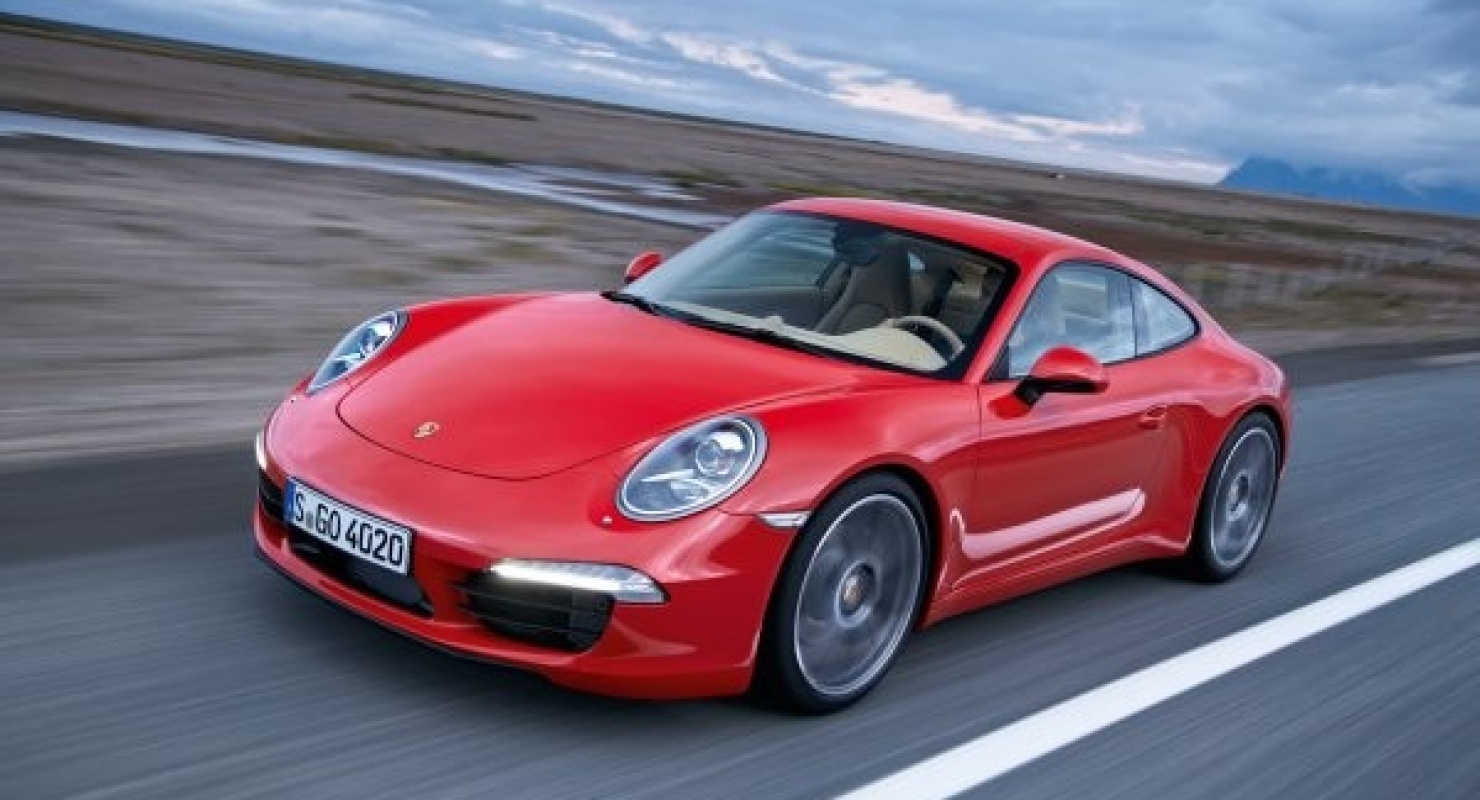 Porsche обновит все проданные модели Taycan Автомобили