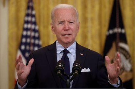 FILE PHOTO: U.S. President Joe Biden delivers remarks on the April jobs report from the East Room of the White House in Washington, U.S., May 7, 2021. REUTERS/Jonathan Ernst/File Photo