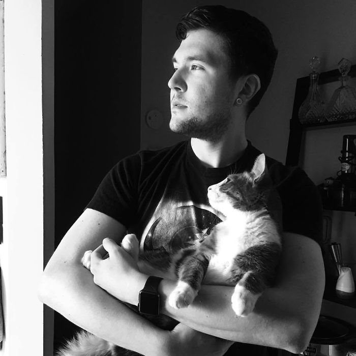 Man Cuddles Cats On Instagram