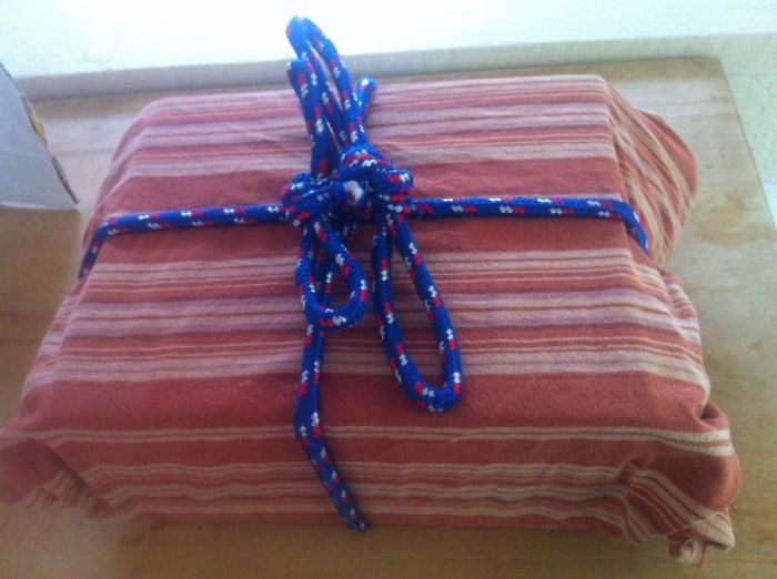 This Is How My Husbands Wraps Gifts. That Is An Old Tablecloth And Rope... He Said 