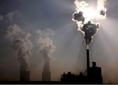 FILE PHOTO: A coal-burning power plant can be seen in the city of Baotou, in China's Inner Mongolia Autonomous Region, October 31, 2010. REUTERS/David Gray/File Photo