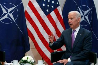 U.S. Vice President Joe Biden gestures during a meeting with NATO Secretary General Jens Stoltenberg (not pictured) at the 51st Munich Security Conference at the 'Bayerischer Hof' hotel in Munich February 7, 2015. Biden said on Saturday that Washington wanted a peaceful solution to the conflict in Ukraine but added that Kiev had a right to defend itself against Russia and that the United States would provide it with the means to do so. REUTERS/Michaela Rehle (GERMANY - Tags: MILITARY POLITICS) - LR2EB2717LHYI