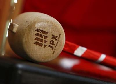 A logo of Japan Exchange Group Inc. is seen on a gavel before the New Year opening ceremony at the Tokyo Stock Exchange (TSE), held to wish for the success of Japan's stock market, in Tokyo, Japan, January 4, 2016. Japan's Nikkei fell 1 percent, playing catch-up to falls in U.S. stocks in the last two sessions during Japan's market holidays. The Nikkei gained around 9 percent last year. REUTERS/Yuya Shino