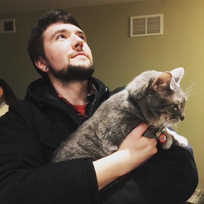 Man Cuddles Cats On Instagram