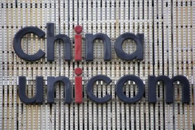 China Unicom's company logo is seen at its branch office in Beijing, China, April 21, 2016.REUTERS/Kim Kyung-Hoon