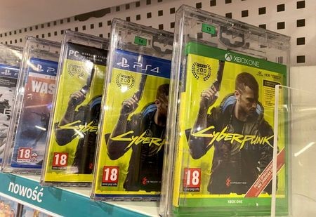 Boxes with CD Projekt's game Cyberpunk 2077 are displayed in Warsaw, Poland, Dec. 14, 2020. REUTERS/Kacper Pempel