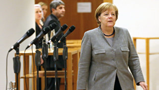 Ангела Меркель во время переговоров о формировании коалиционного правительства в Берлине. 19 ноября 2017