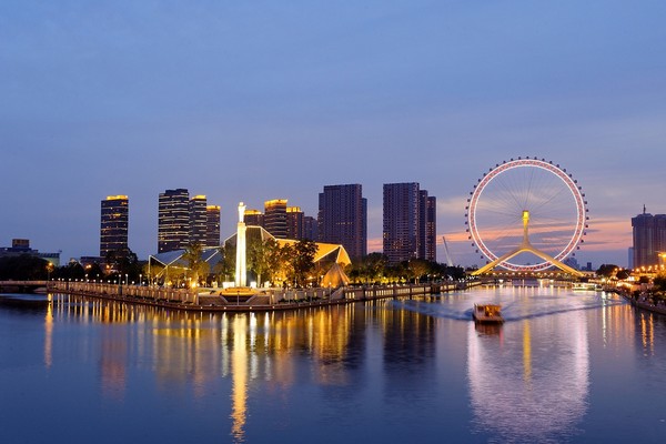 Tianjin Eye – колесо обозрения на мосту Tianjin Eye – колесо обозрения на мосту