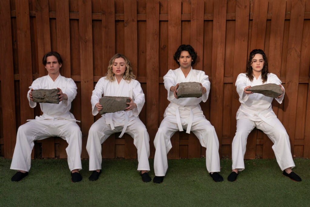 Cobra Kai. (L to R) Tanner Buchanan as Robby Keene, Peyton List as Tory Nichols, Xolo MaridueÃ±a as Miguel Diaz, Mary Mouser as Samantha LaRusso in Cobra Kai. Cr. Curtis Bonds Baker/Netflix Â© 2024