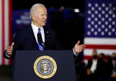 FILE PHOTO: U.S. President Joe Biden delivers remarks on infrastructure at the Kansas City Area Transportation Authority in Kansas City, Missouri, U.S., December 8, 2021. REUTERS/Jonathan Ernst