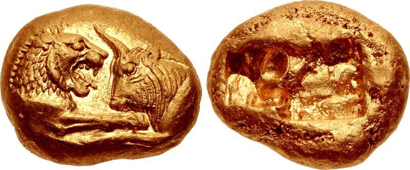 ​Золотой статер Крёза с изображением льва и быка. 16 мм, вес 10,76 г. Около 550 года до н.э. en.wikipedia.org - Владыки золота | Warspot.ru