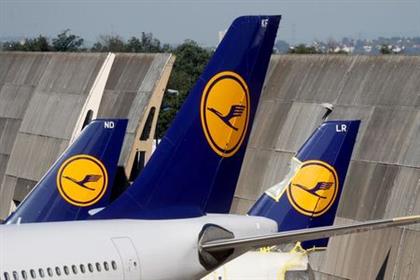 Lufthansa planes are seen parked on the tarmac of Frankfurt Airport, Germany June 25, 2020. REUTERS/Kai Pfaffenbach 