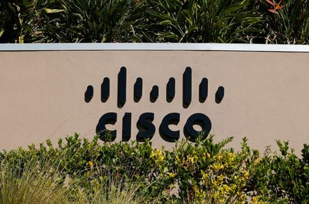 A sign marking a Cisco office is pictured in San Diego, California November 12, 2012. Tech investors hoping for good news may have to look further than Cisco Systems Inc's quarterly report as analysts expect Chief Executive John Chambers to be pessimistic in his forecast for the coming year. REUTERS/Mike Blake (UNITED STATES - Tags: BUSINESS LOGO)