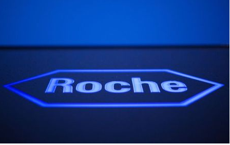 FILE PHOTO: A logo of Swiss pharmaceutical company Roche is pictured in front of the company's building in Rotkreuz, Switzerland, April 12, 2012. REUTERS/Michael Buholzer/File Photo GLOBAL BUSINESS WEEK AHEAD
