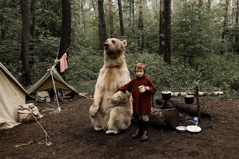 Like in a fairy tale. pictures of Russian family playing with a bear 08