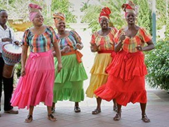 https://assets.simpleviewinc.com/simpleview/image/upload/c_fill,h_431,q_75,w_574/v1/clients/jamaica/02_1_Feel_The_Vibe_Music_TraditionalDance_fd151311-5abb-4dff-b20d-ceab766c8a76.jpg