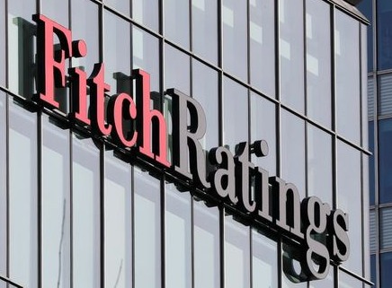 FILE PHOTO: The Fitch Ratings logo is seen at their offices at Canary Wharf financial district in London,Britain, March 3, 2016. REUTERS/Reinhard Krause/File Photo