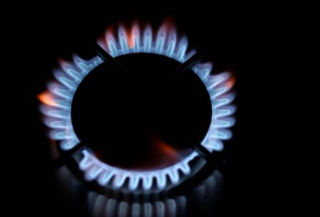 FILE PHOTO: Flames come out of a domestic gas ring of an oven in Durham, Britain, September 23, 2021. REUTERS/Lee Smith/File Photo