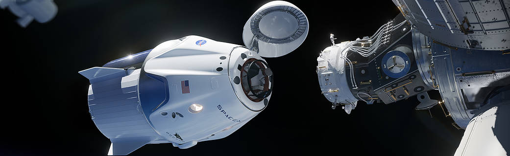 The SpaceX Crew Dragon spacecraft docks to the space station