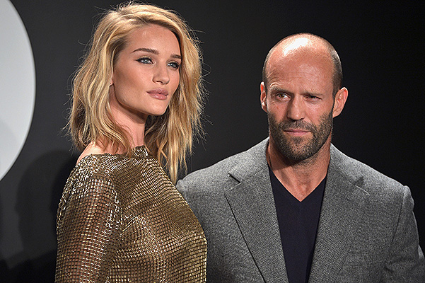 LOS ANGELES, CA - FEBRUARY 20: Model Rosie Huntington-Whiteley (L), wearing TOM FORD, and actor Jason Statham attend the Tom Ford Autumn/Winter 2015 Womenswear Collection Presentation at Milk Studios in Los Angeles on February 20, 2015. (Photo by Charley Gallay/Getty Images for Tom Ford)