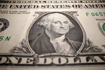 A U.S. Dollar banknote is seen in this illustration taken May 26, 2020. REUTERS/Dado Ruvic/Illustration