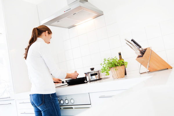 woman-cooking-in-clean-kitchen