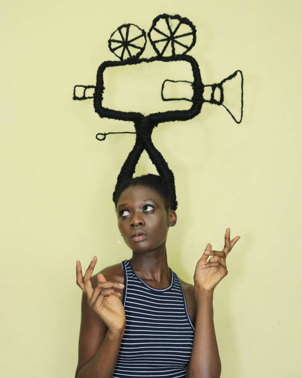 Удивительные прически художницы из Кот-д’Ивуара волосы
