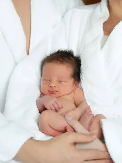 Лерчек и Луис Сквиччиарини с сыном