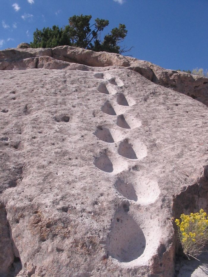 Foot Holds Deeply Worn Into The Volcanic Rock Along The Trail At Tsankawi, A Popular Hiking Area